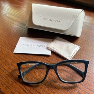 Michael Kors Prescription Glasses Medium Blue with gold metal arms. 52-17-140.